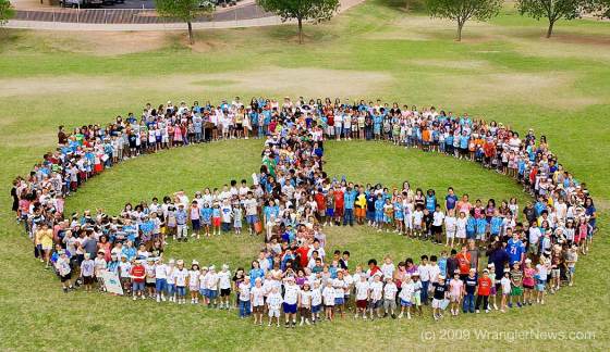 700 Children form Peace Symbol - photo by WranglerNews.com